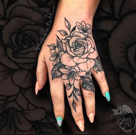 flowers tattoo hand